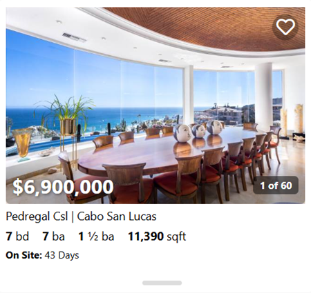 7-bedroom Pedregal estate featuring a formal oceanview dining room with curved windows and luxury finishes – 11,390 sqft, $6.9M